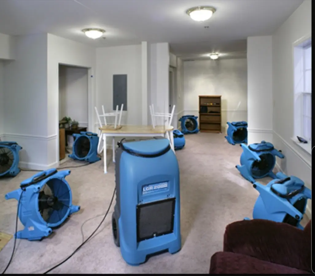 Air movers and dehumidifier setup for Water Damage Restoration in Addison